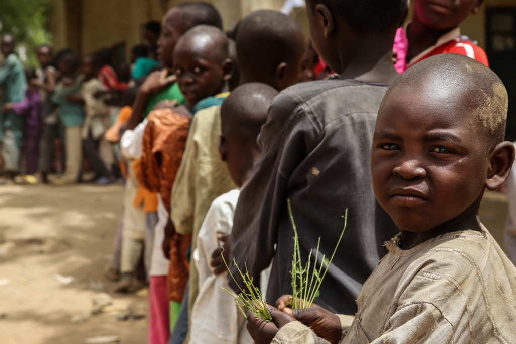 A child waits in the queue for a meningitis vaccination in Damaturu town, in the north-eastern Nigerian state of Yobe. Photographer: Igor Barbero/MSF