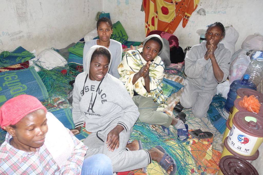 Some of the about 40 inmates present in the detention center at the time of visit. They reported being from Nigeria and held here since 1 month without any contact to with the outside world or their families back home. Very depressed women and desperately asking for help. <br/><br/>NB: Oral consent for all inmates to be taken in picture. Photographer: Tankred Stoebe