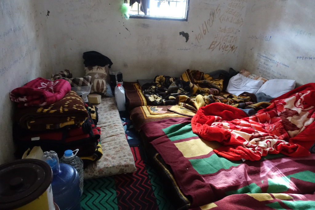Room where inmates are held inside the a detention Center west of Misrata. Rooms are overcrowded, not clean and all inmates complained about scabies, a skin-infection associated with poor hygiene and living conditions. Photographer: Tankred Stoebe