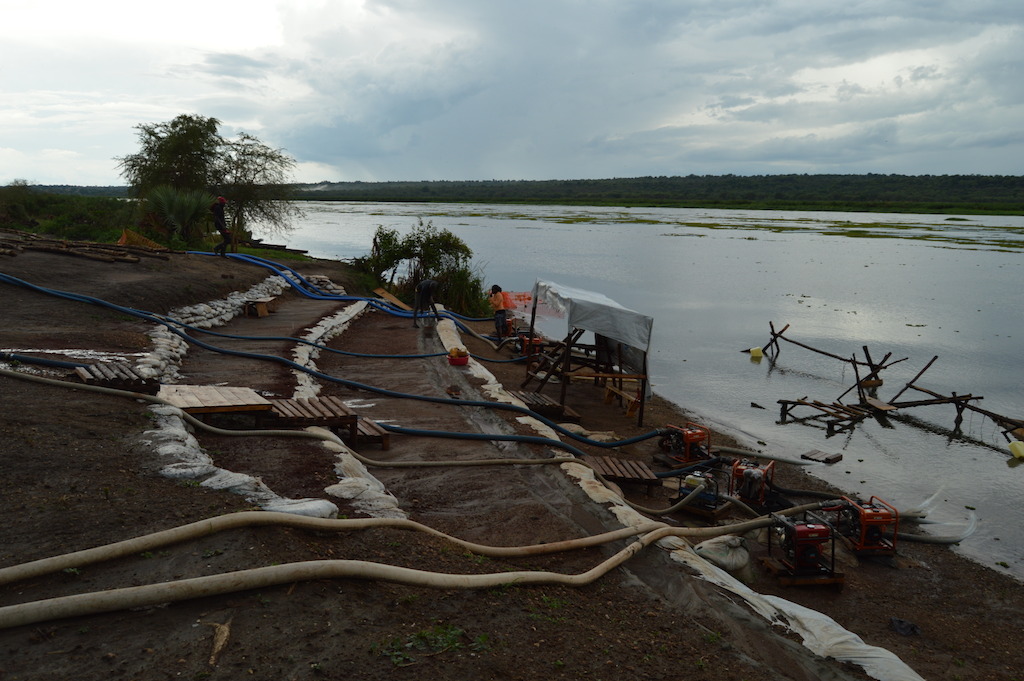 Water pumps are seen at MSF’s water treatment plant in Palorinya refugee settlement, northern Uganda. MSF produces an average of 2 million litres per day from the Albert Nile River, which is delivered to tanks throughout the settlements by water trucks rented by UNHCR. Bad road conditions make it difficult for trucks to access all areas of the settlements after heavy rains, leaving several areas vulnerable to water shortages. <br/>By 5 May 2017, there were over 901,755 South Sudanese refugees in Uganda, with the number expected to rise to nearly one million by the end of the year. Some 86% of the South Sudanese refugees in Uganda are women and children under 18, and an average 2,000 new refugees arrive each week. Uganda is now the largest hosting country for South Sudanese refugees, and also the country hosting the largest population of refugees in Africa. Photographer: Yuna Cho/MSF