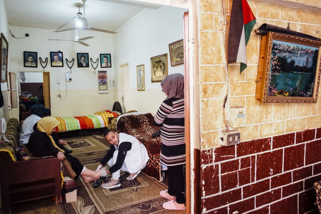 “When they visit me I feel better. They visit me two or three times a week. I tell them that I’m out of my medication and they get it for me,” says Amina Banat. Photographer: Bruno De Cock