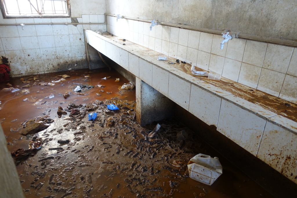 Sanitation area in a detention Center west of Misrata, ankle- deep urin and feces in the only place which inmates can use for washing and sanitation. No running water, no toilets or functioning showers at the time of visit. Photographer: Tankred Stoebe