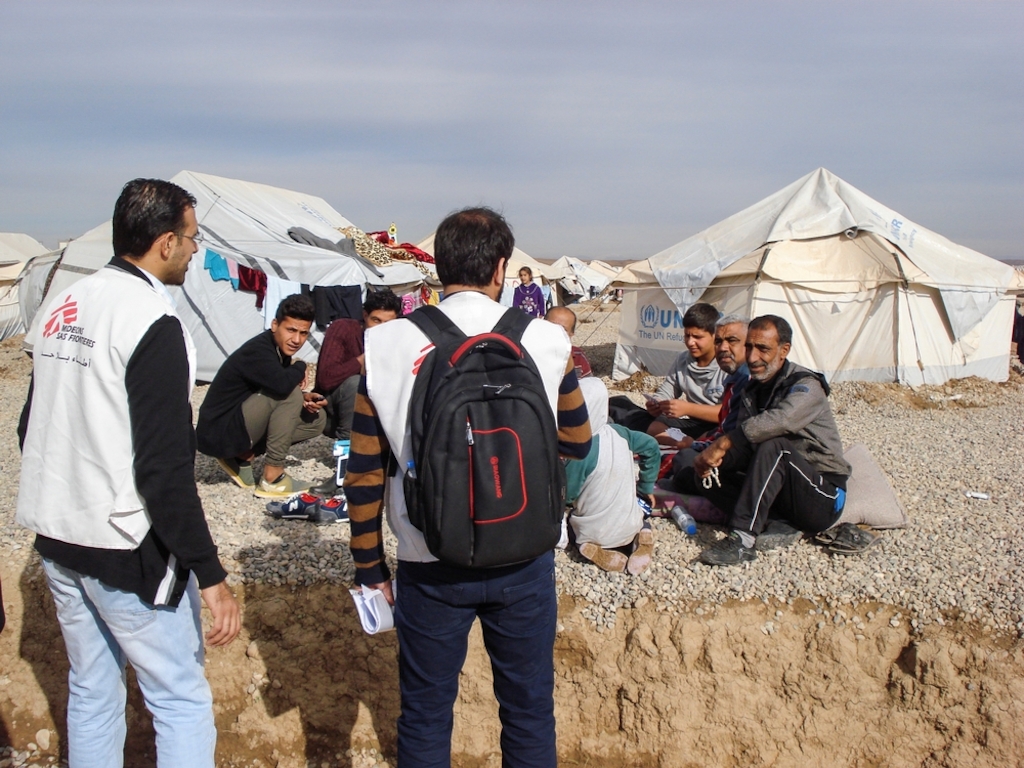 A counsellor is meeting families in the camp to explain them that they can consult a MSF psychiatrist or a MSF psychologist if they feel the need. Photographer: Brigitte Breuillac/MSF