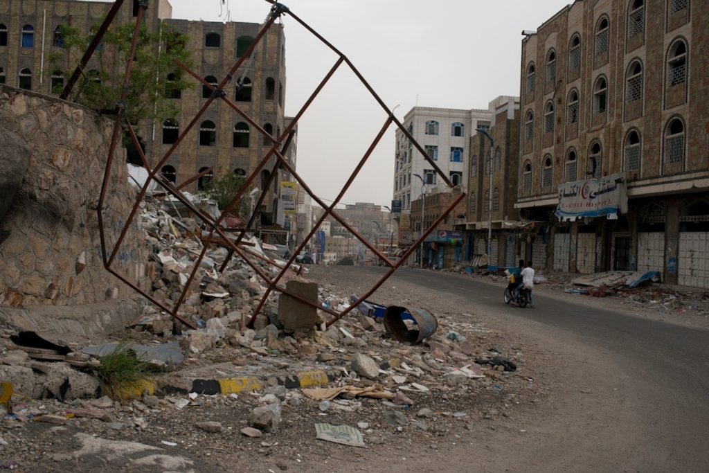 A local school sits flattened by an<br/>airstrike on July 24, 2015 in Taiz, Yemen.<br/>Credit: Alex Potter