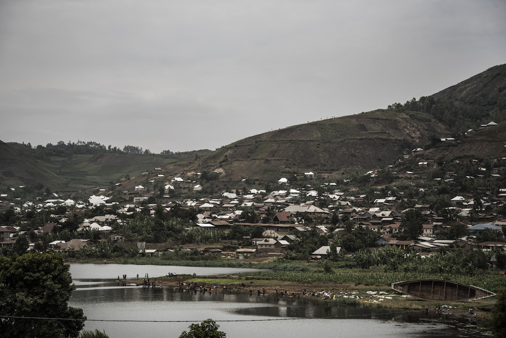 Minova sits next to Lake Kivu, which is likely to be contaminated. But despite knowing that it may harbour contagious microbes, many people have no option but to draw water from it. Photographer: Arjun Claire