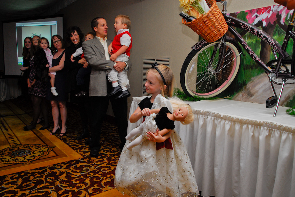 A NICU gradute, Beth Harrison greets guests at the Celebration of Miracles.