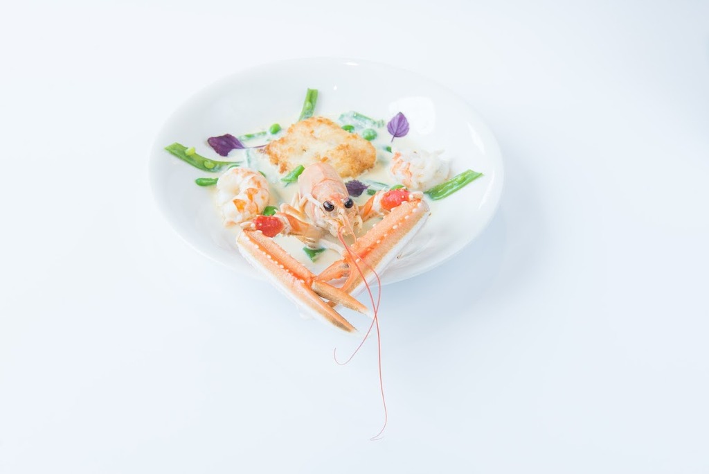 Lobster - Gebakken pladijs met een langoustinestaartje.