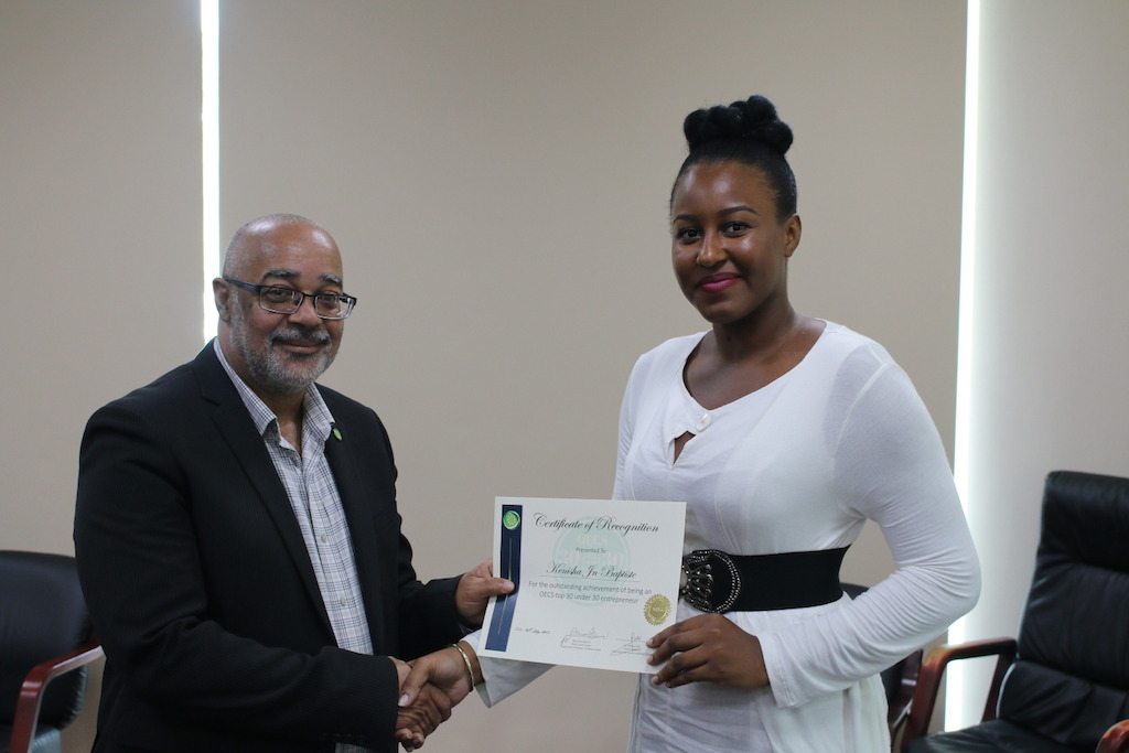Kenisha Jn, 30 under 30 winner and Dr Didacus Jules, Director General of the OECS Commission