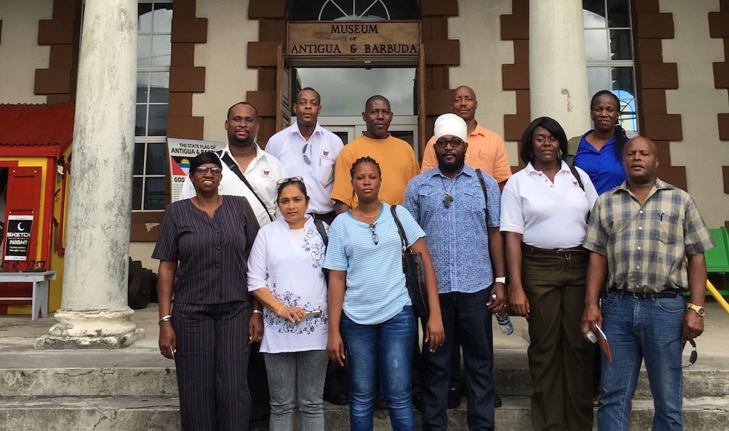 Training participants stand for a photograph outside of the Antigua and Barbuda Museum