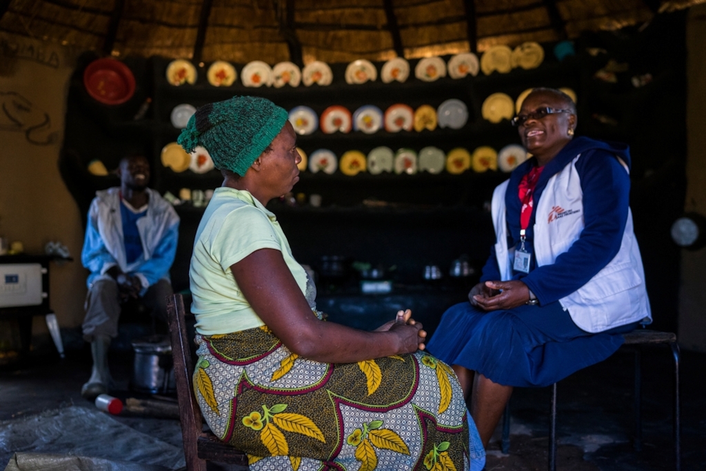 Beauty (36) and her husband Mr Chigouriemba (28) talk with MSF nurse mentor Sister Tendai about the possibility if having a child before having her uterus removed. © Melanie Wenger