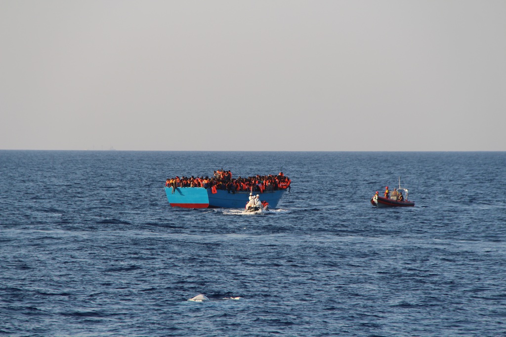 Dignity RHIB approaching wooden boat with approx. 600-700 ppl on board. Photo: MSF
