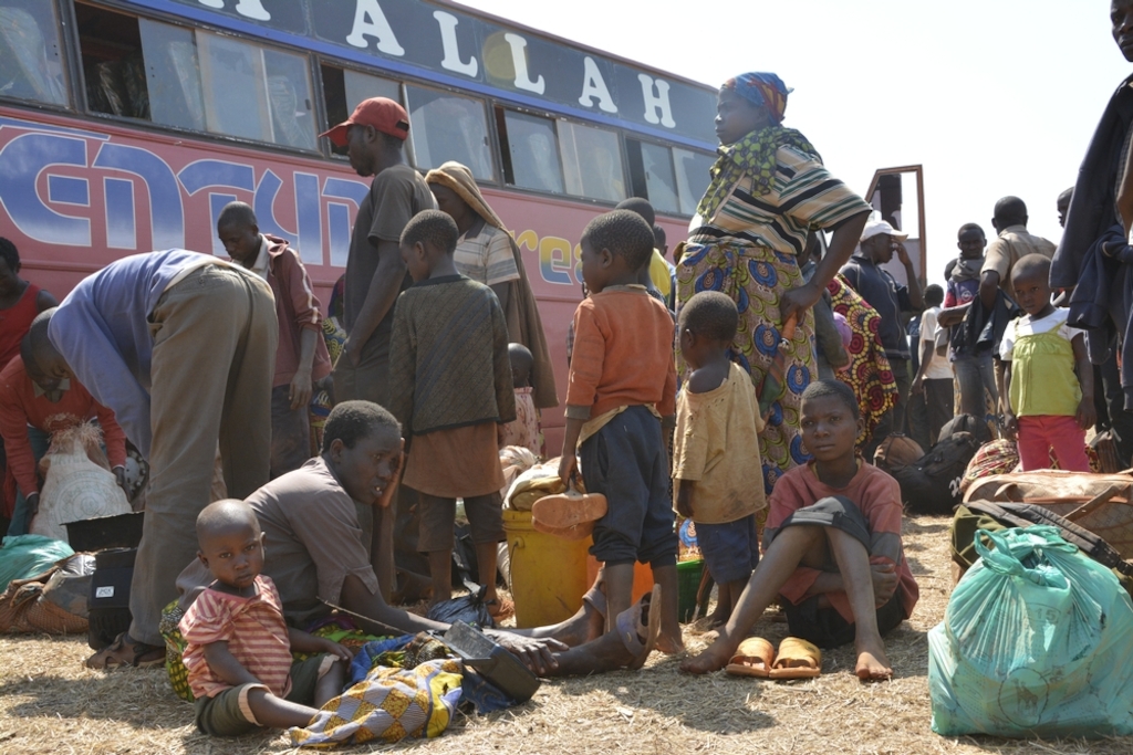 System identifier: MSF149778<br/>Title: Nyarugusu camp - Tanzania<br/>Photographer / cameraman: Louise Annaud<br/>Countries: Tanzania<br/>Description: Arrival of a bus with new Burundian refugees coming from Kigoma. Some people have been on the road for a week and had to walk for miles.
