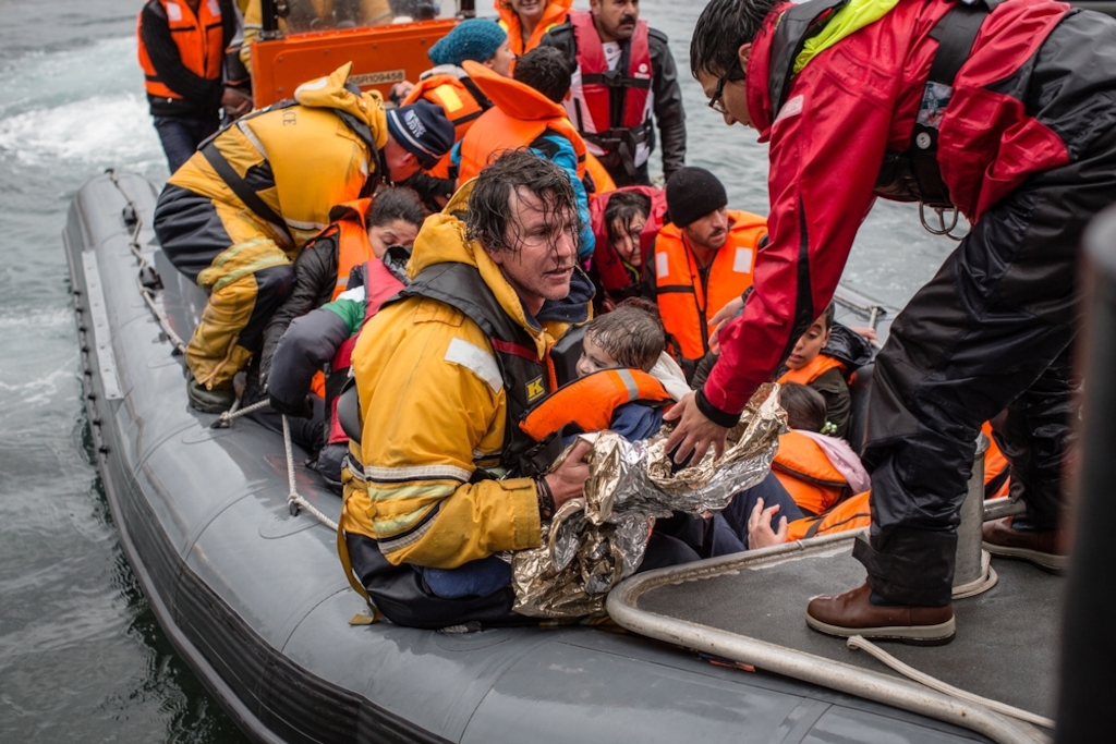Photographer: Will Rose<br/><br/>Caption: Doctors Without Borders (MSF) and Greenpeace boat crews responded to an emergency on December 16 as a wooden refugee boat capsized about mile and a half off the coast of Lesbos. On arrival to the scene all refugees were in the water and a major rescue operation involving Greenpeace, MSF, Frontex, Sea Watch and Proactiva ensued. A total of 83 people were rescued, while two people drowned - an 80-year-old man and nine