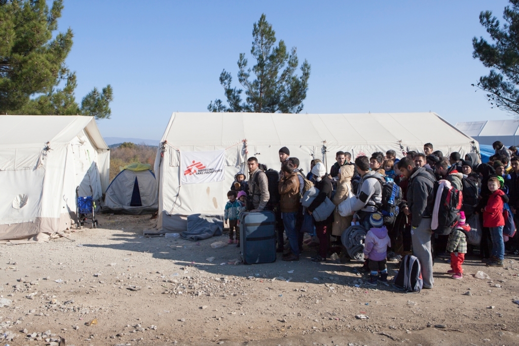 Photographer: Alex Yallop<br/><br/>Caption: Refugees from Iraq, Afghanistan and Syria wait to cross the border from Greece to Macedonia at Idomeni.