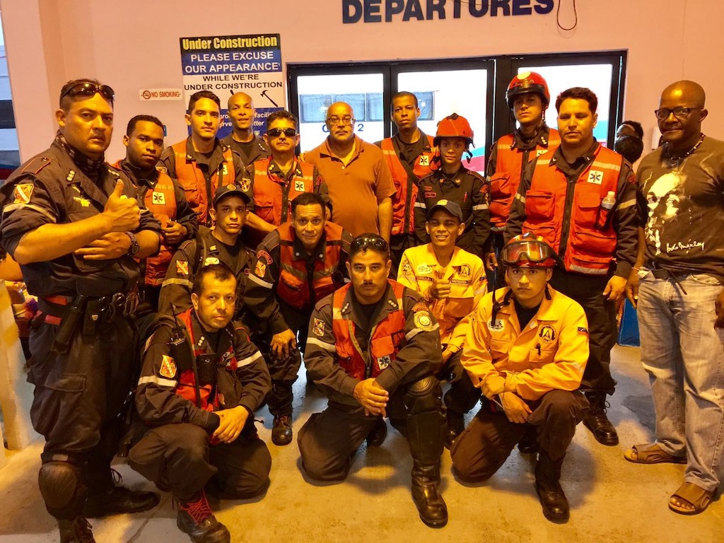 OECS Director General Dr. Didacus Jules meets with the Venezuelan Search and Rescue team prior to embarking on their life saving mission to Dominica