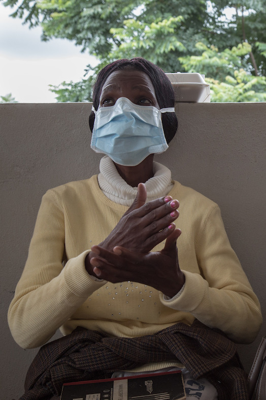 Winile, who is deaf due to the side effects of the MDR-TB treatment, is learning sign language in the MSF Matsapha clinic. Matsapha, Manzini Region, Swaziland. Photographer: Alexis Huguet