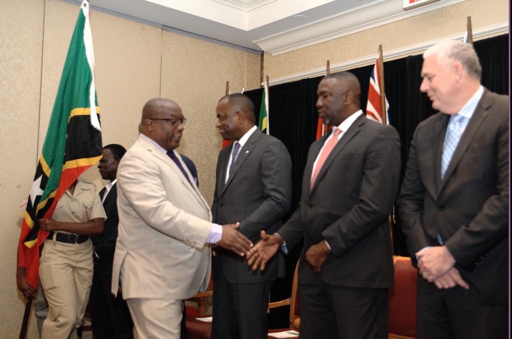 Chairman, Dr. the Honourable Timothy Harris, Prime Minister of St. Kitts and Nevis, greets OECS Heads of Government at the Opening Ceremony.