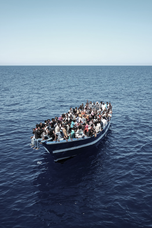 Credit: Christophe Stramba-Badiali / MSF<br/>Caption: Bourbon Argos rescues in the Mediterranean (July-August 2015). Eritrean migrants on a boat in distress before being rescued by Medecins Sans Frontiers and the Bourbon Argos. Two boats were found, carrying 700 people. According to the refugees, a third boat had left the Libyan coast along with them . This third boat could not be located by MSF. An Irish ship rescued people aboard the third boat the day after.