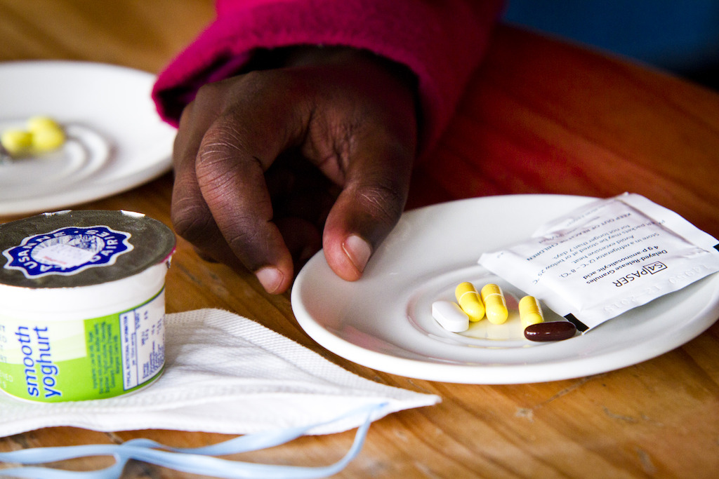 Phumeza Tisile, 23 years, takes her last tablets for XDR-TB at Lizo Nobanda TB Care Centre, Khayelitsha, South Africa on August 16, 2013. During her two year treatment for XDR-TB, Phumeza took over 20,000 pills and had over 200 injections. Photographer: Sydelle WIllow Smith
