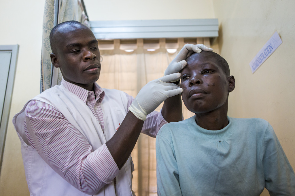 Homa Bay, Kenya: Zipporah, 33 years, was tested for HIV in 2016 but started taking antiretrovirals in February 2017 because she was afraid of the treatment. She has Kaposi Sarcoma, a form of cancer which occurs in late stages of HIV infection and will start chemotherapy soon.<br/><br/>In Homa Bay hospital, MSF supports the Kenyan Ministry of Health in providing comprehensive HIV services, including specialized hospital care for AIDS. Photographer: Patrick Meinhardt