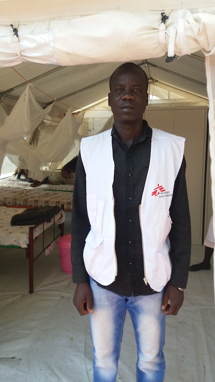 For the last two years, Francis Ronyo has worked as a nurse in MSF’s Wau Shilluk hospital. He was one of the national staff on duty when the decision was taken to evacuate and leave for Kodok. Since he arrived in Kodok, he doesn’t have a place to stay and ends up sleeping in the open with the rest of the people from Wau Shilluk. He however decided to continue serving the sick and the wounded in any way he could and is now providing medical are in the MSF clinic in Aburoch. Photographer: Riaz Hussain