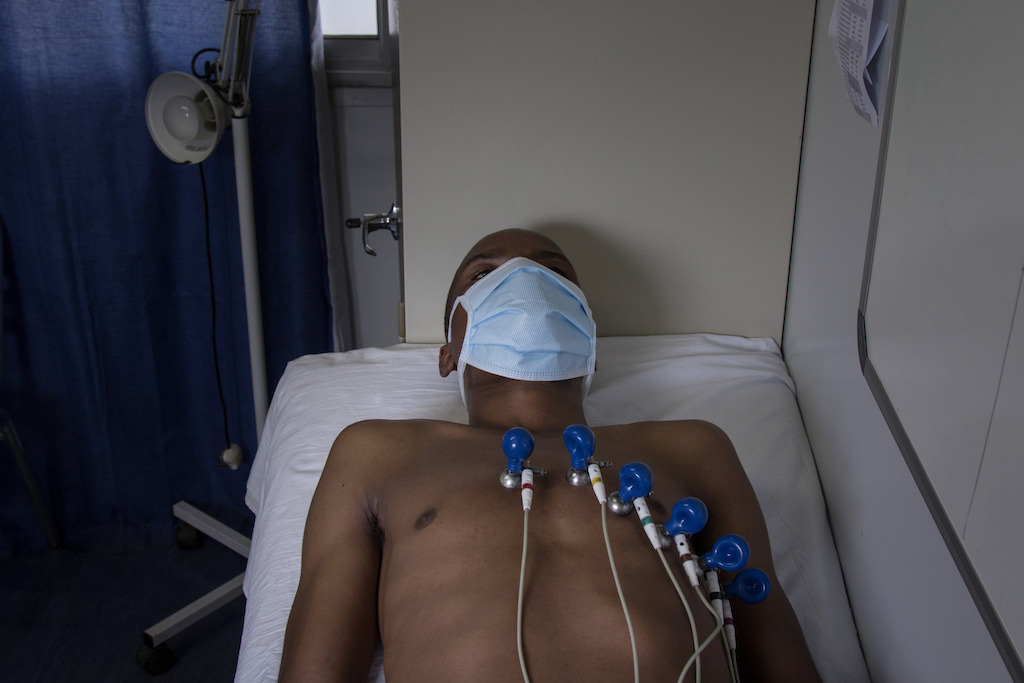 Phumlani, 27, an MDR-TB patient, on the nine-months short course regimen. He's undergoing an electrocardiogram in the MSF Matsapha clinic. Matsapha, Manzini Region, Swaziland. Alexis Huguet
