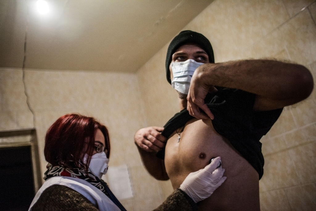 System identifier: MSB17477<br/>Title: Conflict effect on population. Donetsk region, Ukraine JAN 2015<br/>Photographer / cameraman: Manu Brabo<br/>Countries: Ukraine<br/>Description: A patient infected with TB is treated by a member of MSF staff within a prison in Donetsk, Ukraine, where MSF is helping to treat patients infected with TB.<br/><br/>MSF has been running a DR-TB treatment program within the penitentiary system in Donetsk since 2011