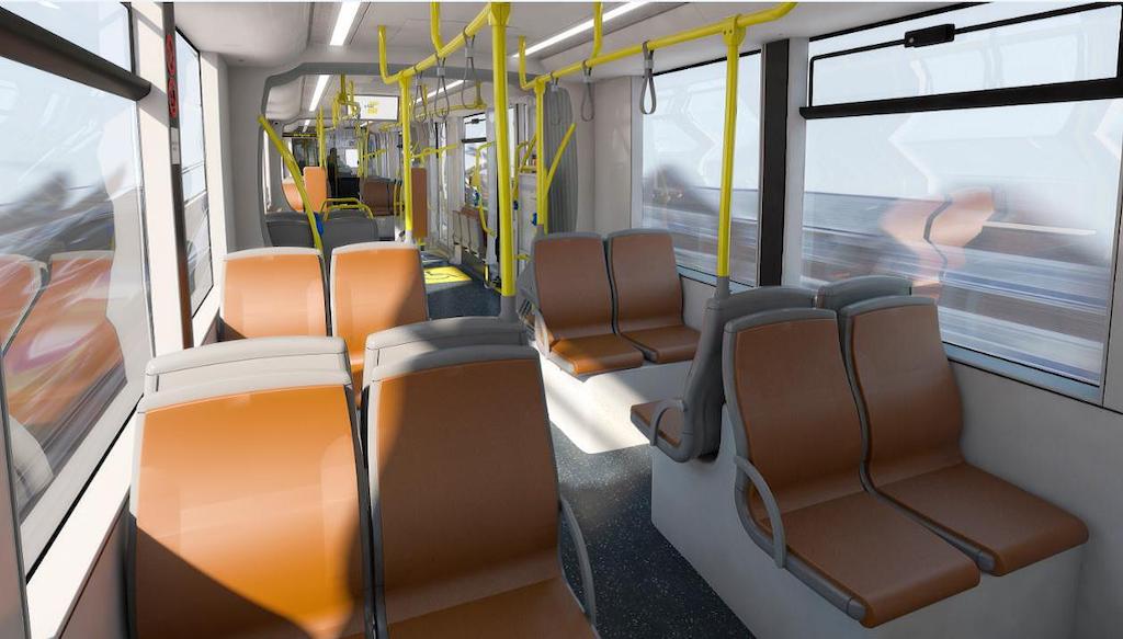 Interieur CAF-tram met zetels in recuperatieleder.