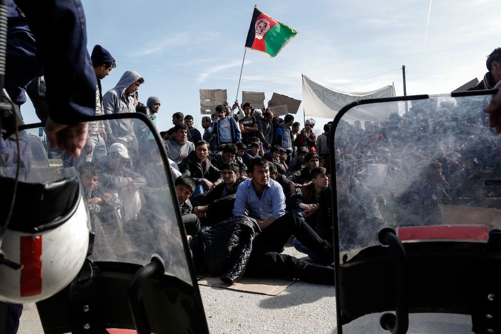 Konstantinos Tsakalidis/SOOC. Afghans protest next to the Greek-Macedonian (FYROM) border near the northern Greek village of Idomeni. The FYROM authorities have closed the border to Afghan refugees.