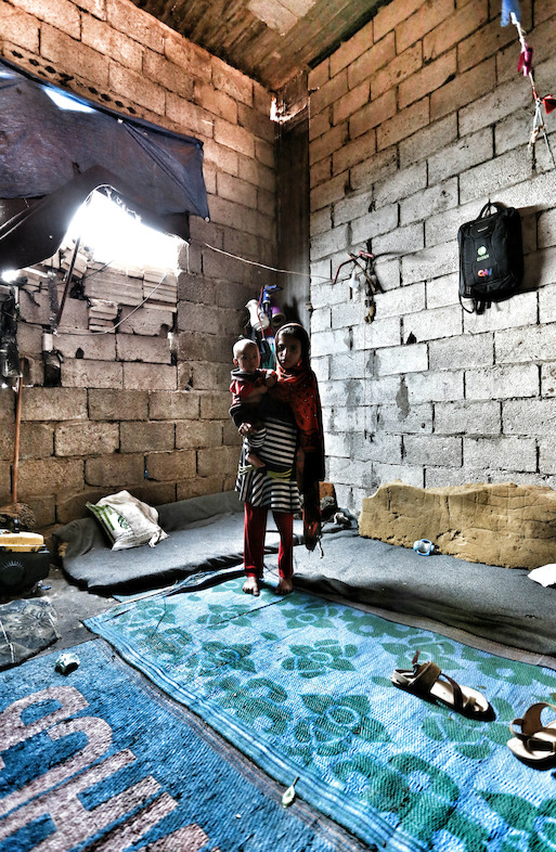 11 year old Hanin is internally displaced. She left her house in the enclave of Taiz city with her family due to the armed conflicts in the area where she used to live. Hanin has been living in Al-Batra area in Huban district for almost a year and five months, she shares an abandoned building with another twelve families. Photographer: Mohammed Sanabani