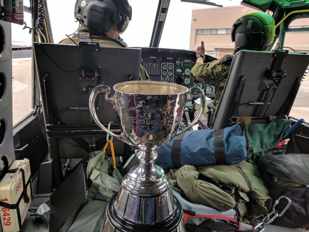 The Grey Cup aboard a CH-146 Griffon helicopter.
