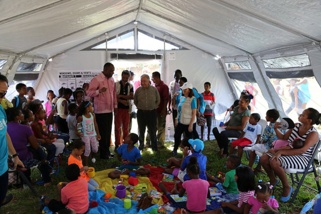 UN Secretary-General and Prime Minister of Dominica meet with children at the Kalinago Territory, Dominica.