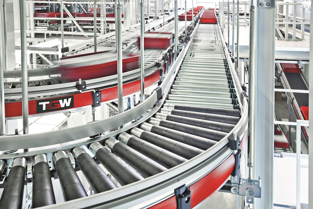 The goods are stored in up to 25 metre high TGW Stingray Shuttle aisles providing highest storage density.