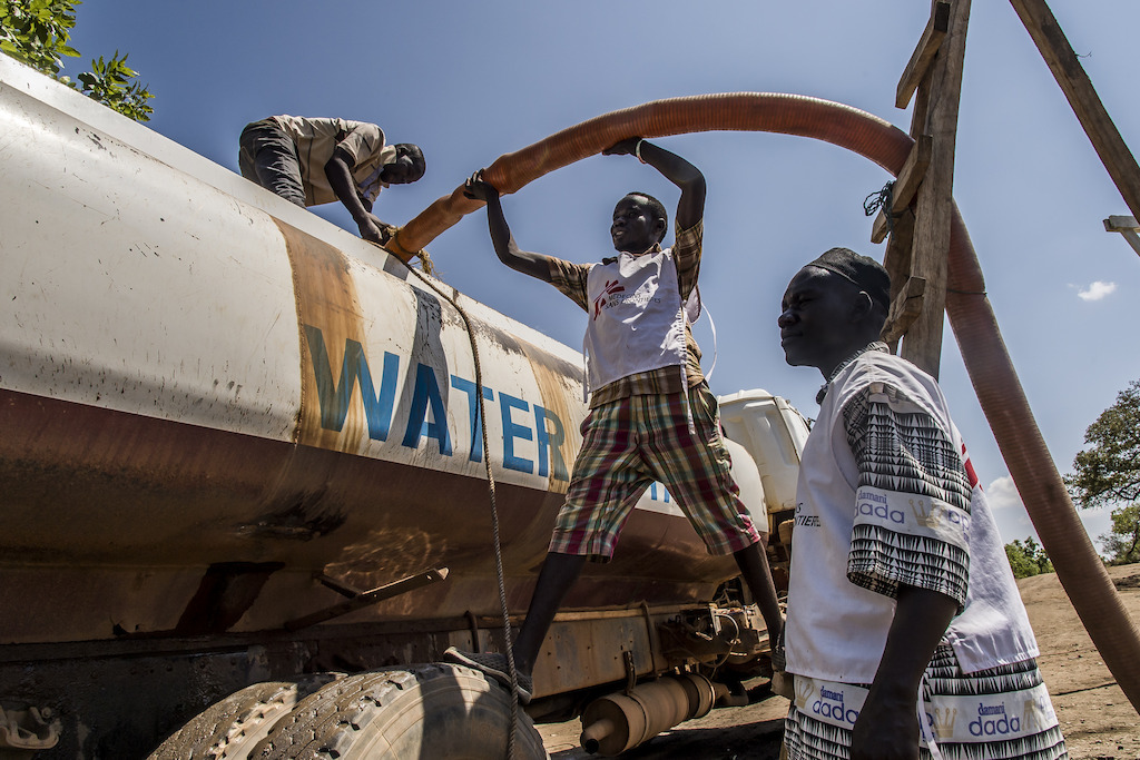 For water supply, MSF has built artesian wells. The water is then distributed in the various water tanks throughout the camp. Here are the tankers in the Dibidibi camp.<br/>Access to safe drinking water is one of the main challenges in refugee camps, and MSF continues to develop its activities in this area. Photographer: Frederic Roy