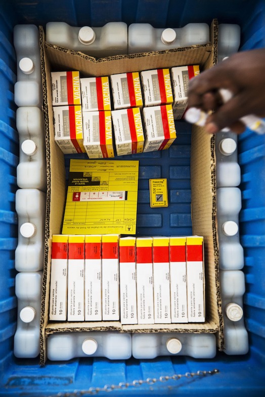 Medecins Sans Frontieres (MSF) staff stock 17.000 icepacks in cooler containers. <br/><br/>The icepacks are cooled at a temperature of minus 22. Before being stored in blue boxes with the vaccines. They are spread out in the sun till they reach a temperature of 0°C. As the vaccines have to be kept at the temperature between +2 and +8°C. Photographer: Dieter Telemans