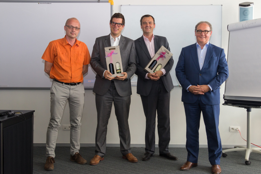 Vlnr.: Jan Bormans van Flanders DC, Marc Herman en Steven Pyck van Accredio en Walter Van Dyck van Vlerick Business School