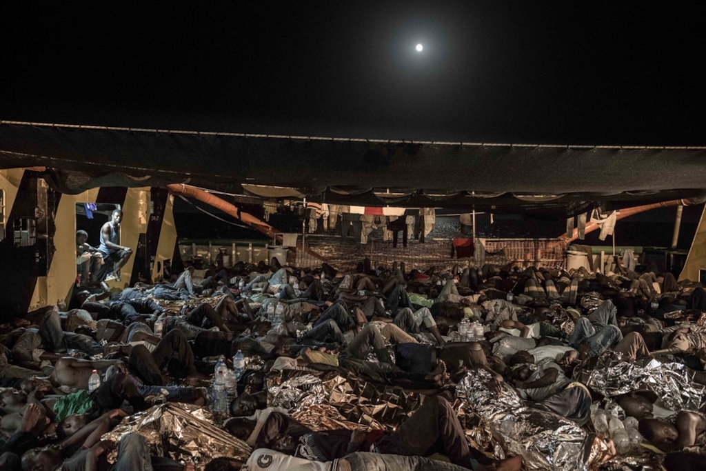 Photographer: Christophe Stramba-Badiali<br/><br/>Caption: 533 people sleep on the deck of the Borbon Argos after being rescued at sea by Doctors Without Borders (MSF) in the Mediterranean.
