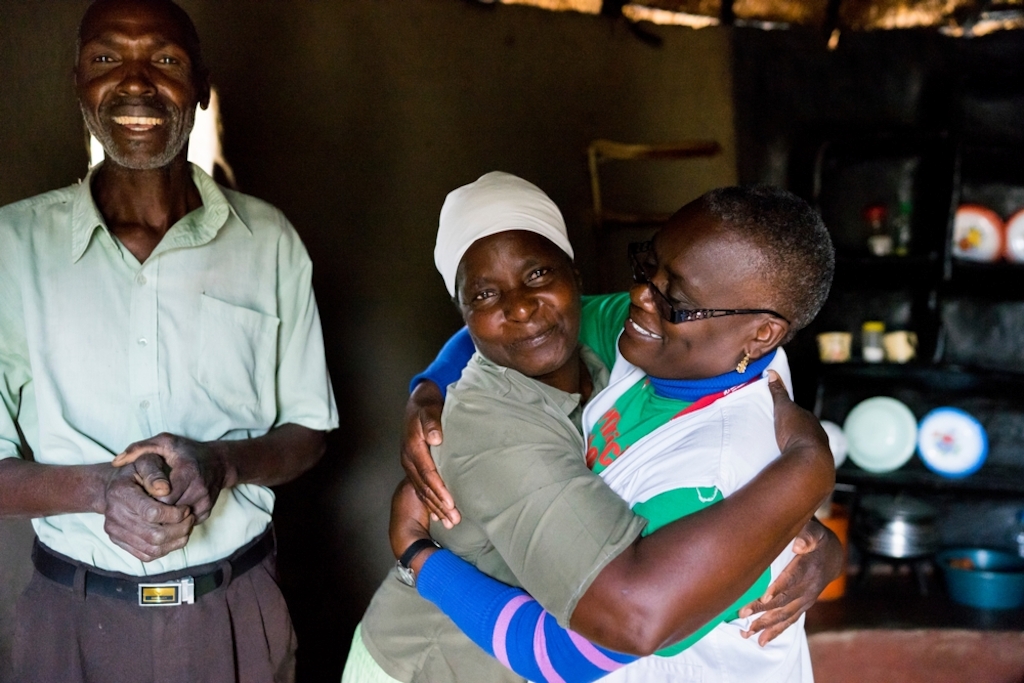 Florence hugs Medecins Sans Frontieres (MSF) nurse mentor Sister Tendai. <br/><br/>Florence has cervical cancer and needs to go to a bigger hospital to get surgery and her uterus removed, today MSF as brought good news, cancer has not spread. But the family is anxious because they do not have any money for medical care, MSF will help them with the surgery. Photographer: Melanie Wenger/COSMOS