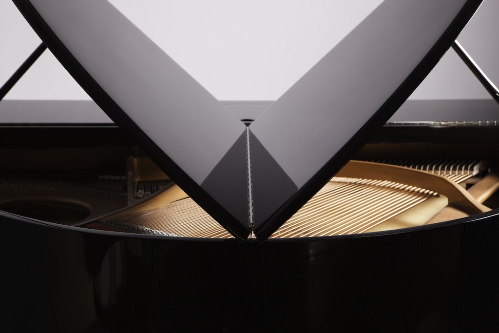 An Edelweiss self-playing piano in close up.
