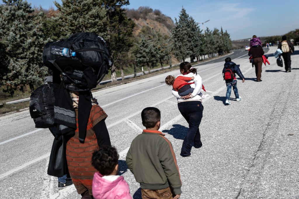 Konstantinos Tsakalidis/SOOC. Refugees and migrants walk towards the Greek-Macedonian (FYROM) border, near Polykastro, Greece. The authorities did not allow the departure of the buses until crowding at the transit camp in Idomeni had eased.