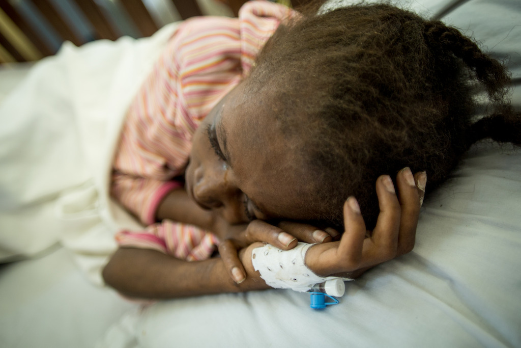 Kinshasa, DRC: Elise, 12, was infected by the HIV virus during her mother's pregnancy. She has been taking antiretroviral treatment (ARVs) for six years. <br/><br/>Elise received her treatment erratically in the early years because of her mother's lack of knowledge on how best to care for an HIV positive child. As a result Elises developed a resistance to the first set of antiretroviral drugs. She had to switch to an alternative set of ARV drugs which have had stronger side effects and are much more difficult to digest, making it an even bigger challenge for her to fully benefit from the life-saving medication.<br/><br/>Elise's fight against HIV became more difficult and painful each day and she lost the battle and died a few days after these pictures were taken. She passed away in the loving care of her mother and MSF's medical team. Her mother Agathe wanted MSF to publish these pictures. « It cannot help Elise, but it may help others in the country », she said. Credit: Rosalie Colfs