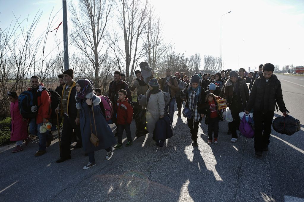 Konstantinos Tsakalidis/SOOC. Refugees and migrants walk from the gas station of Polykastro towards the transit camp in Idomeni. The authorities did not allow the departure of the buses until crowding at the transit camp in Idomeni had eased.