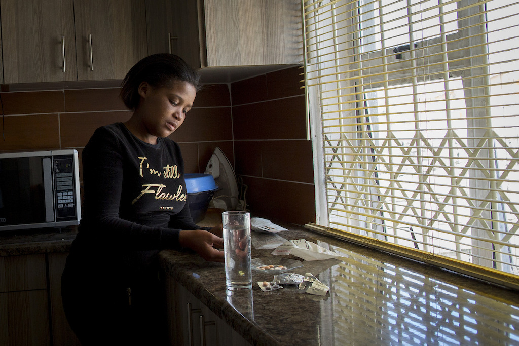 Sinethemba takes her daily regimen for XDR-TB at 10am each day. She also takes two additional delamanid tablets at night. Photographer: Sydelle WIllow Smith / MSF