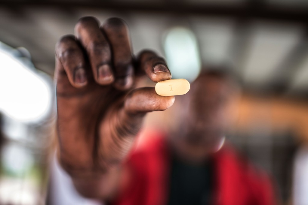 This man was kicked out of his house by his sister in law after being diagnosed wit HIV. He has been taking Antiretroviral drugs (ARVs), which he collects from the Kabinda Hospital, and has almost recovered sufficiently to restart his work. Photographer: Tommy Trenchard