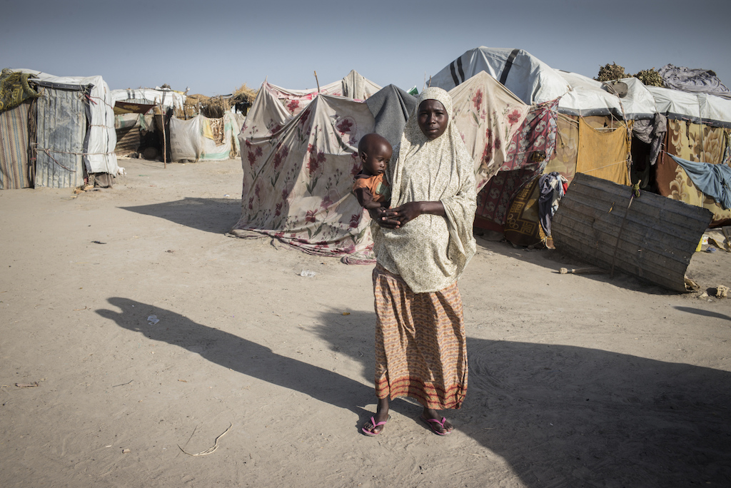 Mariam, 20m mother of two-year old Hussein.<br/><br/>"Nine months ago, Boko Haram attacked my village, and I fled to the camp."<br/>"The vigilance committee denounced my husband to the Nigerian army, they arrested him and asked for witnesses in his favor. But the captain was changed and the new one killed my husband without waiting for the witnesses. There are a lot of similar cases here. " Photographer: Sylvain Cherkaoui
