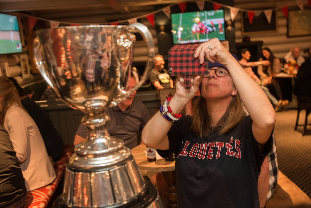 Montreal Alouettes fan take a photo of the Grey Cup. Photo Credit: Jim Ross/CFL