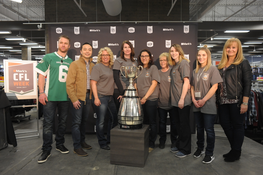 Rob Bagg, David Lui, and Christina Litz with Mark's employees (Photo credit: Mark Taylor)