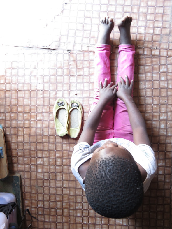 1. A young girl trapped in conditions of poverty, putting her at risk of falling victim to sexual violence, like her older sister. Photographer: Marcus Finiosse