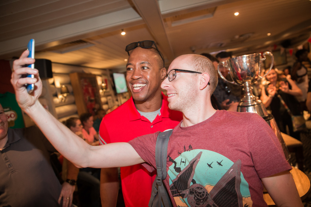 Henry Burris posing with a fan. Photo Credit: Jim Ross/CFL