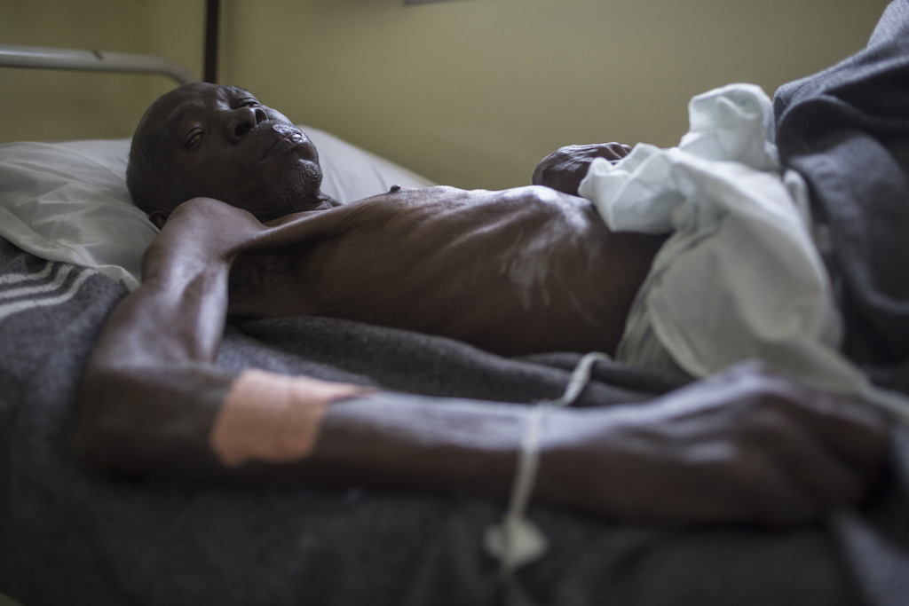 Kinshasa, DRC: A patient* admitted to MSF’s AIDS unit who died of tuberculosis days after this photo was taken. <br/><br/>People arrive at the centre with such severe immune failure that 36% don’t survive the first 48 hours of treatment. Hospital care for these cases requires the speed and urgency of a trauma case.<br/><br/>*consent to use this picture was provided by the family. Photographer: Kris Pannecoucke